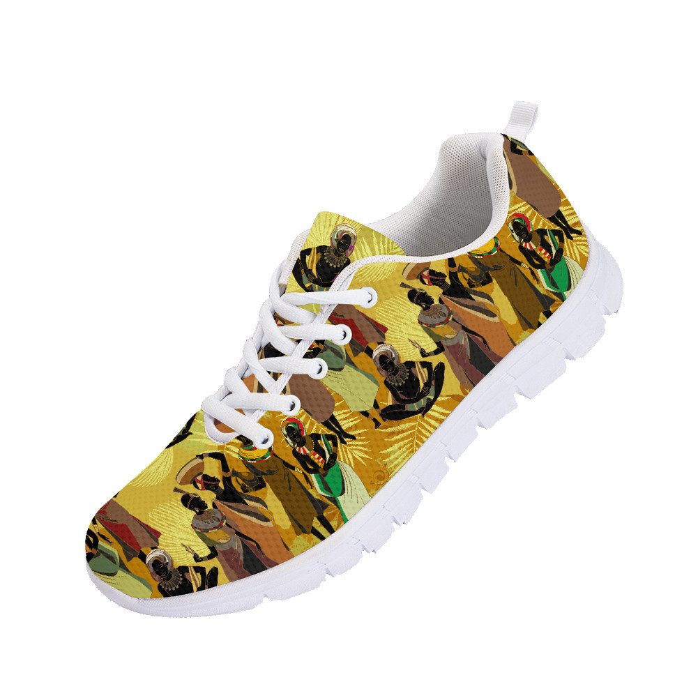 Second image of People Of South Africa In National Clothes On Gold Leaves Background Running Shoes Sport Sneakers